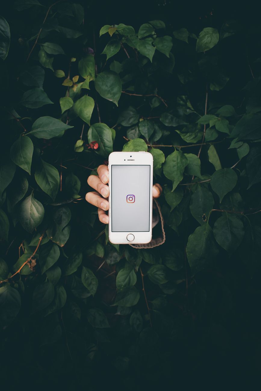 a person holding an iphone